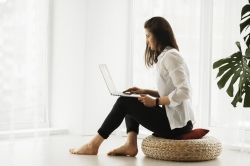 Image of women using telehealth to receive online counseling.